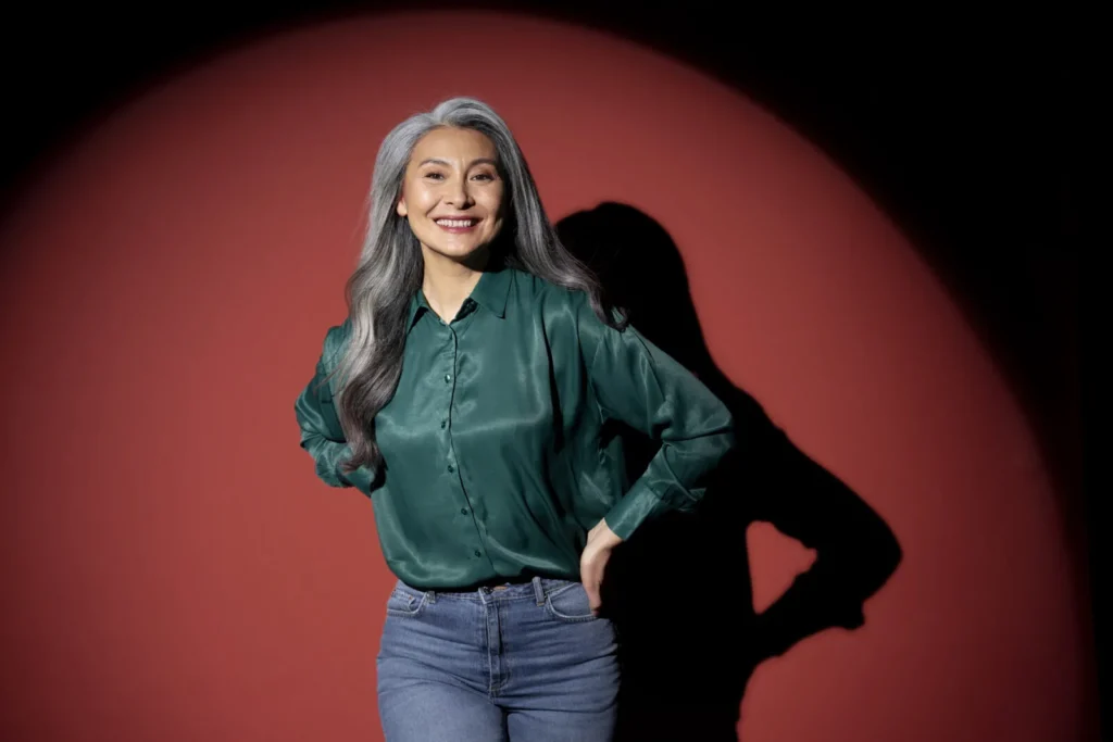 medium shot senior woman spotlight